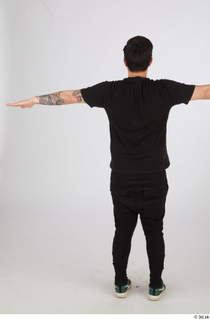 Photos of Miyasaki Kazuki standing t poses tatoo whole body…